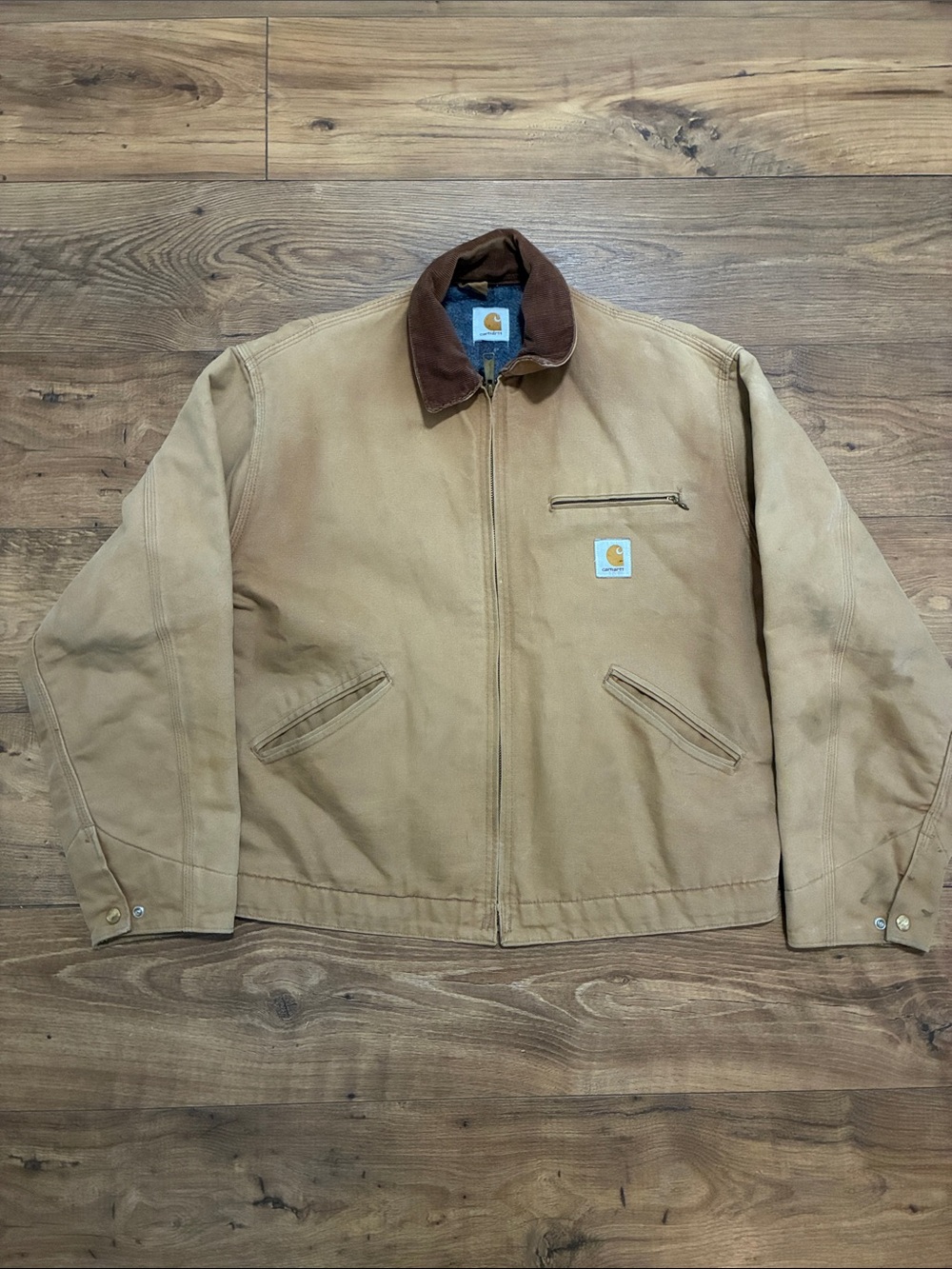 Vintage Carhartt Detroit jacket in brown features a classic size M
